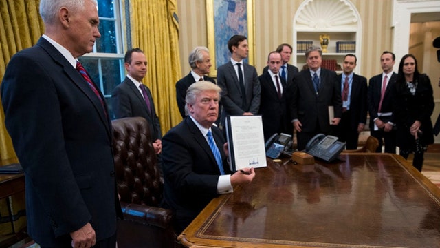 Trump touts executive orders he once lambasted