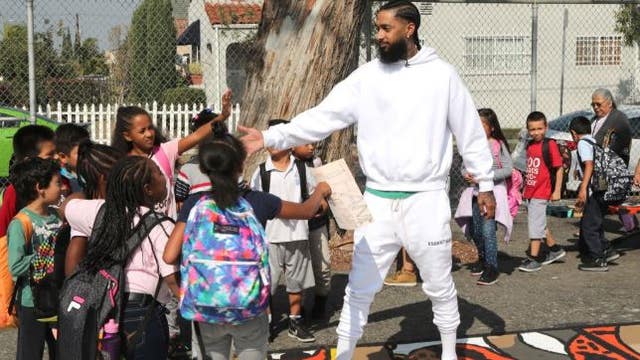 Celebrities, fans and family mourn Los Angeles rapper Nipsey Hussle who was shot and killed at 33