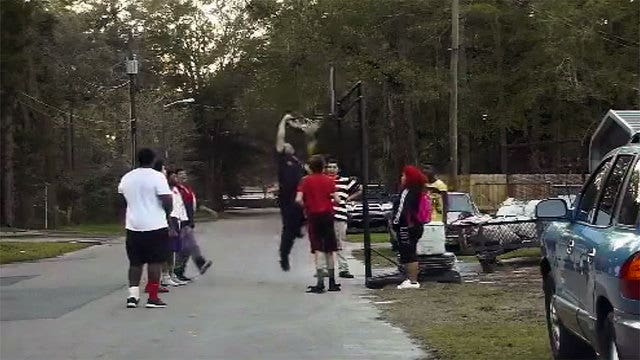 WATCH: See how this police officer handles a noise complaint involving kids shooting hoops