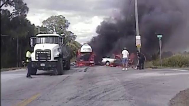 VIDEO: Florida deputies pull woman from burning car