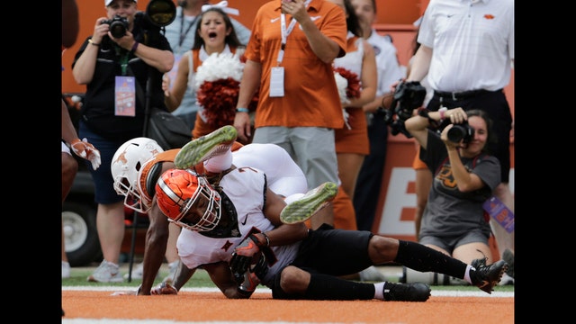 OT interception enables No. 10 Oklahoma State to beat Texas