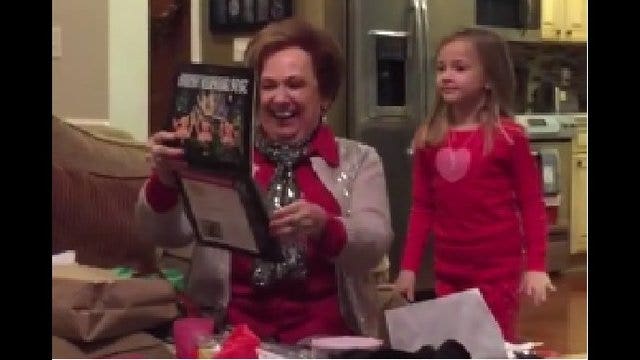 Watch this great-grandma lose it over a hunky fireman calendar