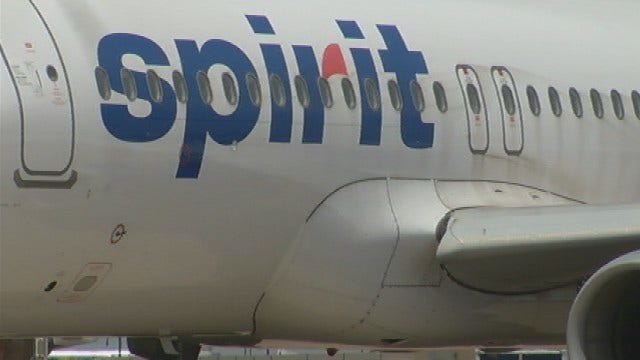 Overbooking, racial protests lead to 7 passengers removed from Spirit Airlines flight