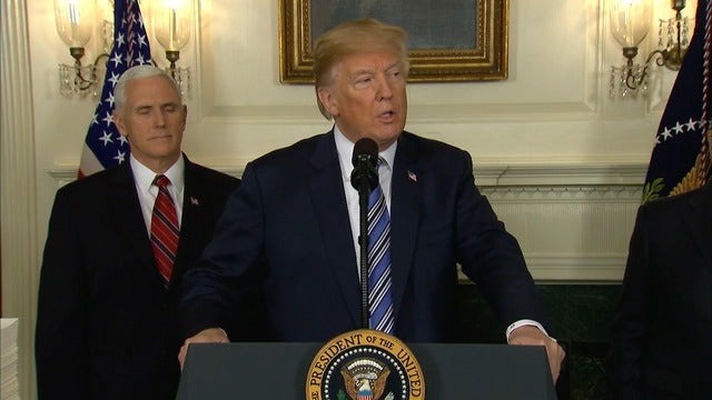 Trump signs $1.3 trillion budget after threatening veto