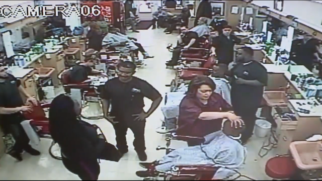 WATCH: Mom pulls gun on barber because son's haircut is taking too long