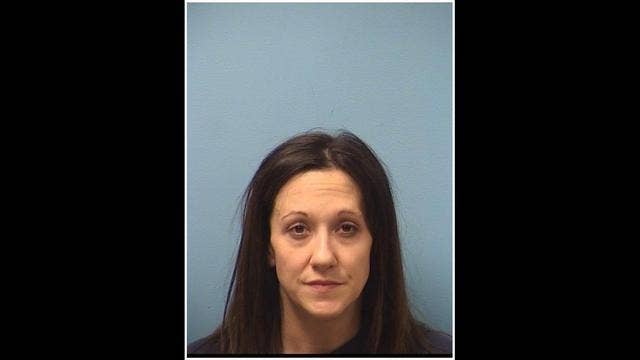 Charges: Woman bit off husband's ear in fight over beer