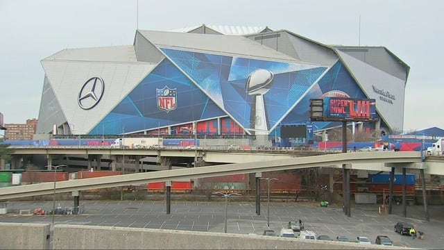 Atlanta sounds alarm over snow; New England fans unfazed