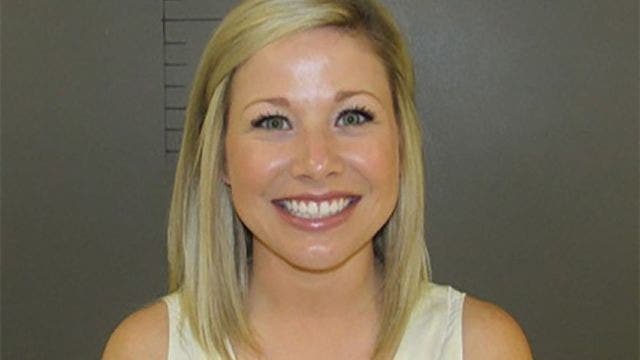 Texas teacher in student-sex bust smiled because she's innocent, lawyer says