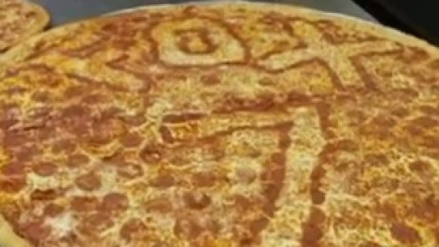 Celebrating National Pizza Day with biggest pie in Texas