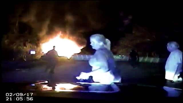 Dramatic rescue caught on police dashboard camera