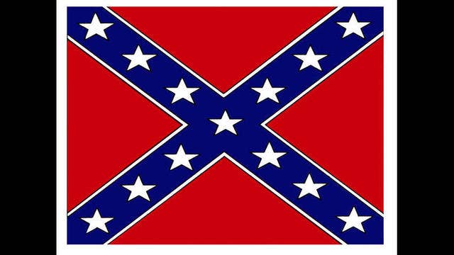 Woman removes Confederate flag in front of SC statehouse