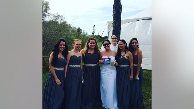 Jilted bride wears wedding dress to color run