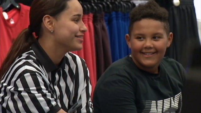 Foot Locker employee buys shoes for boy