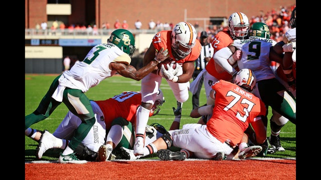 No. 14 Oklahoma St. sets yardage record, beats Baylor 59-16