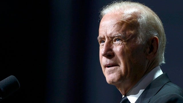 Biden hugs union leader, quips 'I had permission'