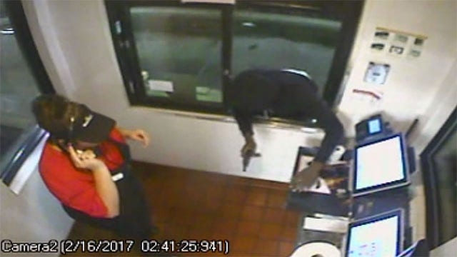 Robber jumps through McDonald's window