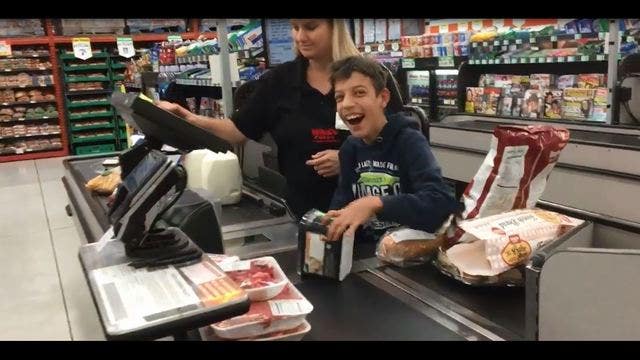 Cashier's act of kindness brings pure joy to special needs teen