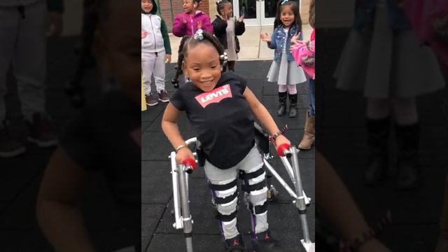 Determined 4-year-old with Spina Bifida walks for first time as friends cheer her on