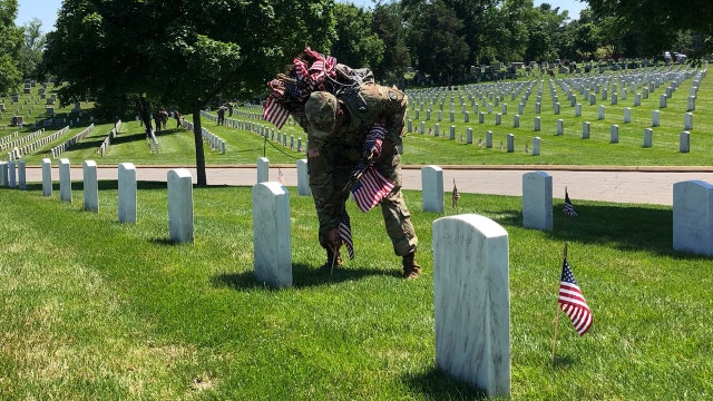 Fallen heroes honored with 'Flags-In' at Arlington National Cemetery