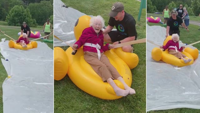94-year-old woman joyously rides rubber duck float down senior home's makeshift slip ‘n slide