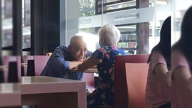 Lovebirds lovingly looking into each other's eyes melts social media's heart