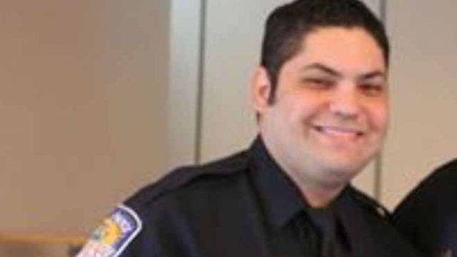 Florida police officer, a father of 3, charged in child porn case