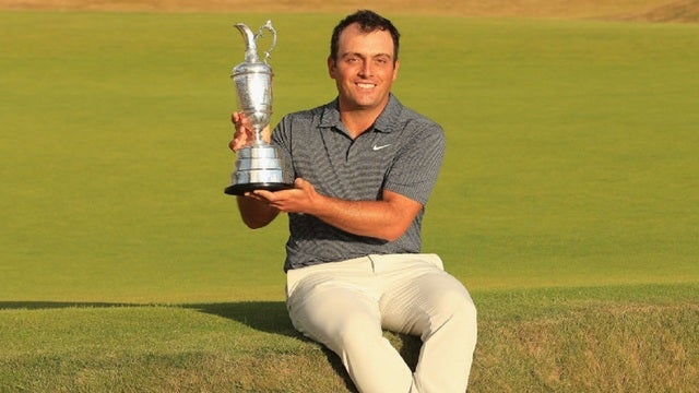 Molinari survives wild day to win British Open