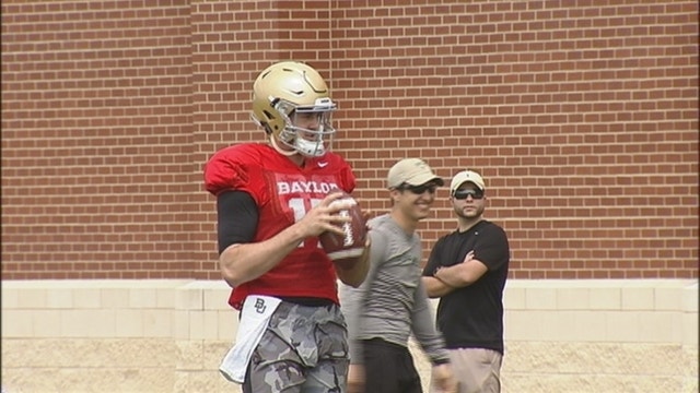 Russell throws for 6 TDs, No. 5 Baylor rolls past Rice 70-17