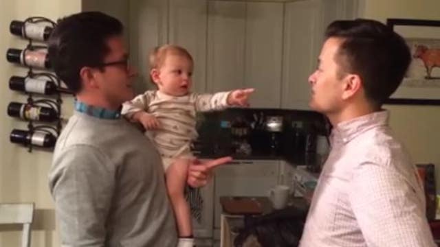 WATCH: This adorable baby is baffled by Dad's twin brother