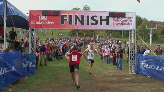 Maine man wins beer in wife-carrying competition