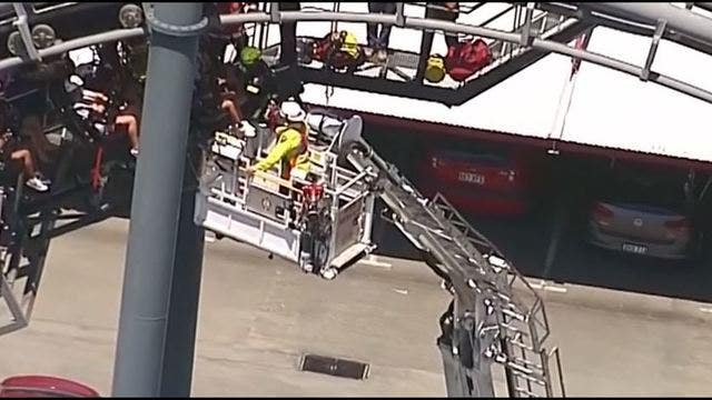 Arkham Asylum roller coaster stuck; passengers rescued