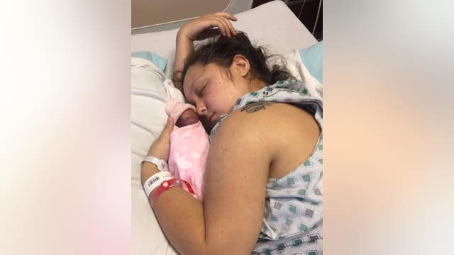 Baby girl lives 2 hours in parents' arms before passing away