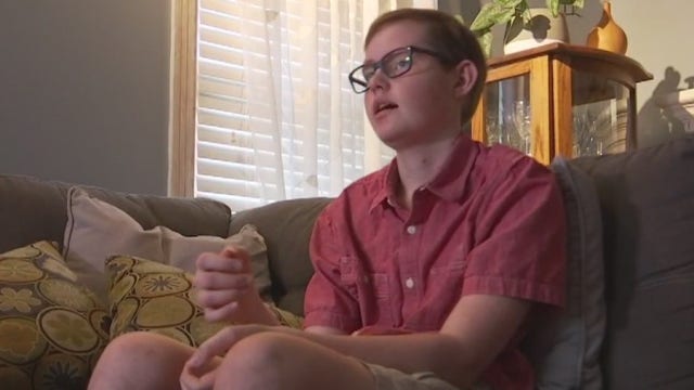 18-year-old Texan beats brain cancer, walks at high school graduation