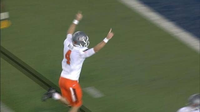 No. 21 Oklahoma State beats WVU 33-26 in overtime