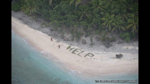 Three men rescued from deserted Pacific island thanks to 'HELP' sign