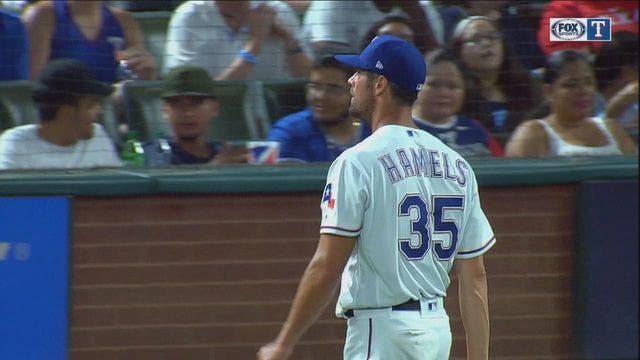 Hamels struggles with scouts watching, A's blow out Rangers 15-3