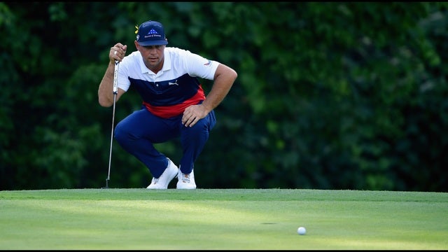 Woodland feels at home in Missouri, leads PGA with 64