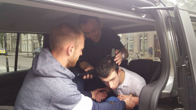Barber cuts hair for autistic teen in his 'happy place'