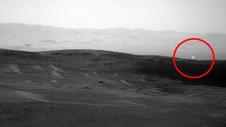 NASA's Curiosity rover captures image of mysterious white ...