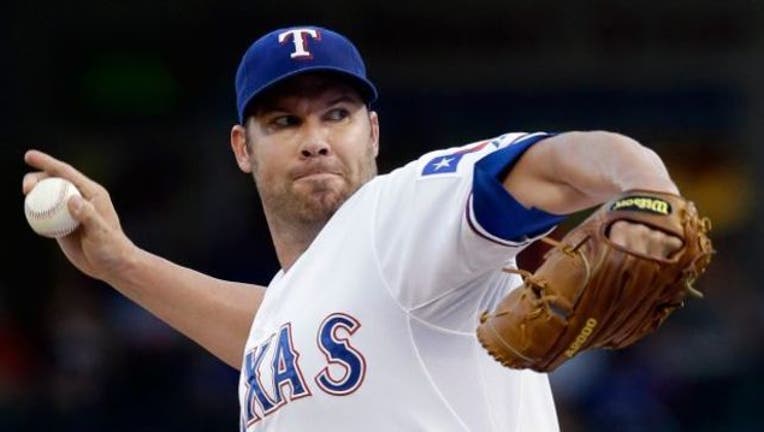 Colby Lewis_1440213253873.jpg
