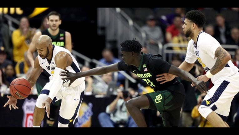 09fe2df8-Jevon Carter_1520571607165