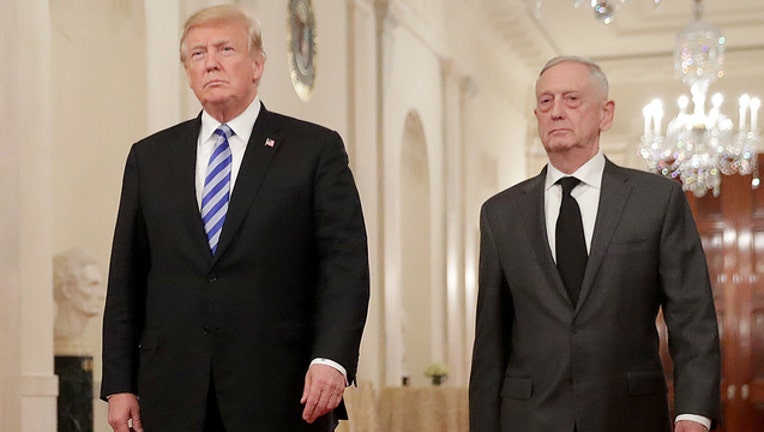 GETTY Mattis and Trump 122018-401720