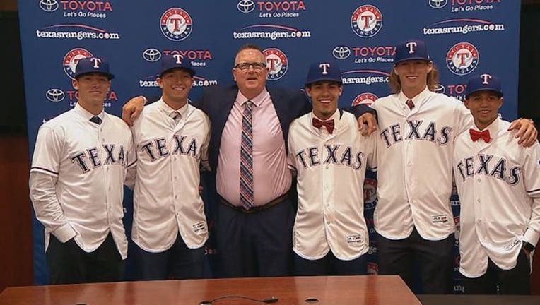 1742d932-Rangers sign draft picks_1528851891437.jpg.jpg