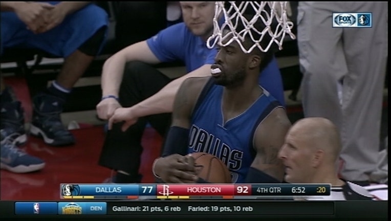 MAVS LOSE TO ROCKETS_1481427994877.jpg