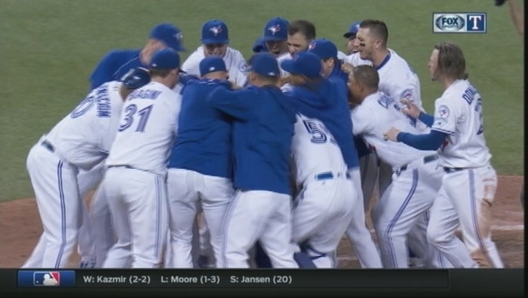 25b5710d-Rangers Blue Jays Walk Off_1462331377138.jpg