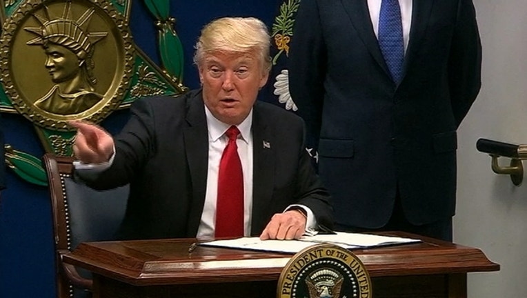 275c1289-trump exec order_1485553816015.jpg