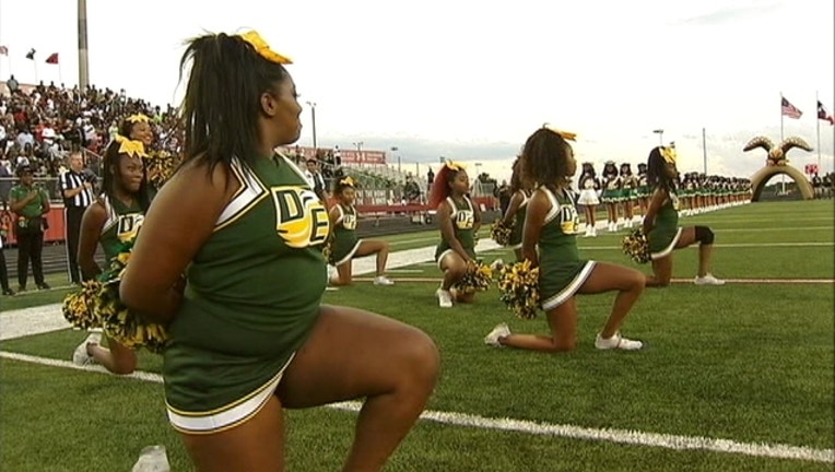 V-DESOTO HS FB PROTEST 9P.t1_1474685189811.jpg