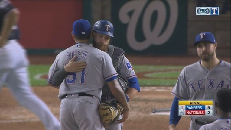 35a83ced-Lucroy Hugs Bush_1497065942271.jpg