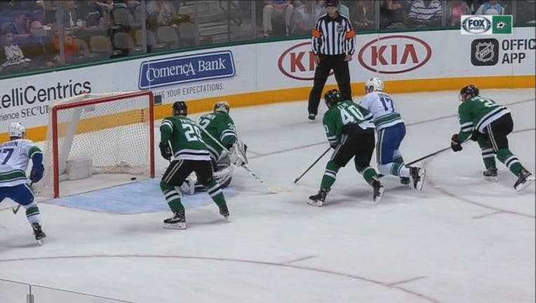 Stars vs Canucks_1522032409229.jpg