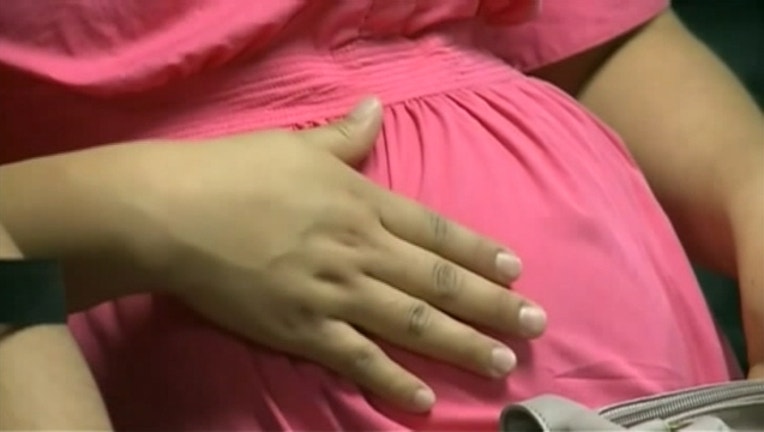 ZIKA GARLAND PREGNANT WOMAN_1463784032720.jpg